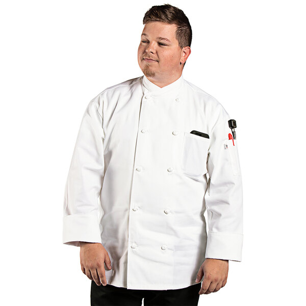 A man wearing a white Uncommon Chef long sleeve chef coat.