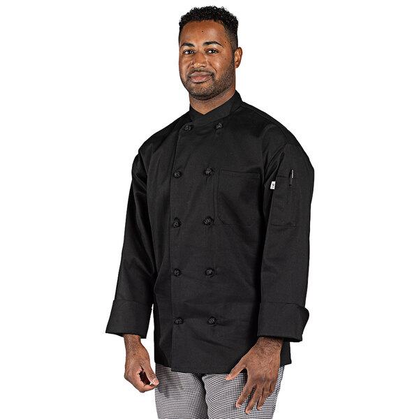 A man wearing a black Uncommon Chef long sleeve chef coat.