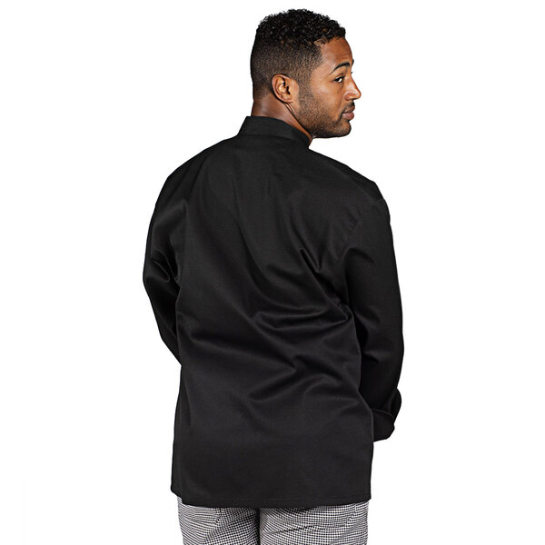 A man wearing a black Uncommon Chef long sleeve chef coat.