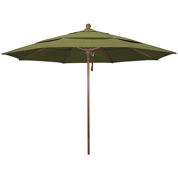 A green umbrella with a wooden pole.