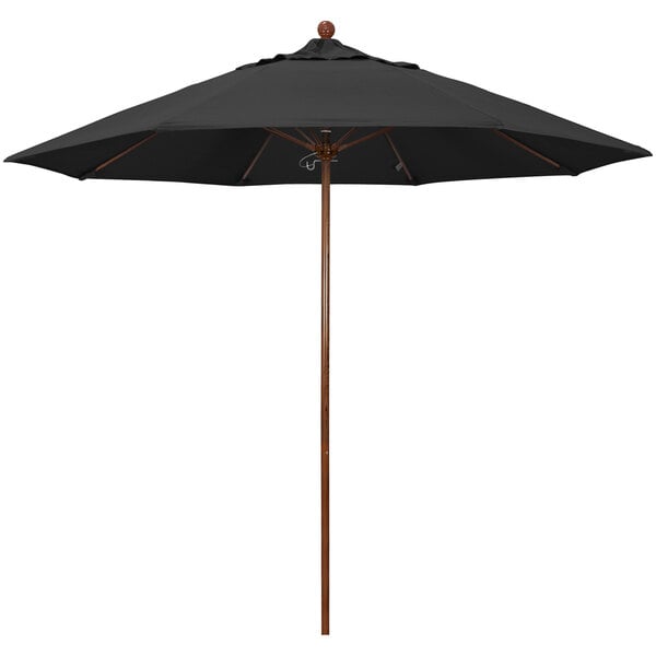 A black California Umbrella with a wooden pole.