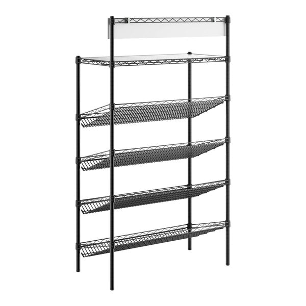 A black metal shelving unit with one flat shelf at the top and four slanted wire baskets below, supported by four vertical posts.