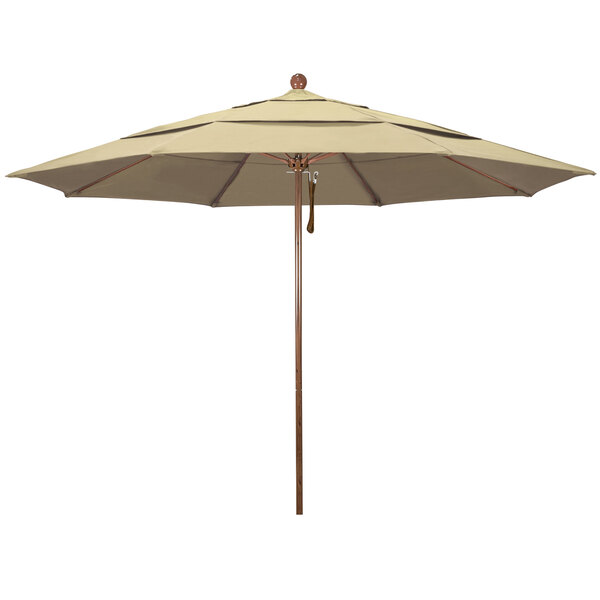 A beige California Umbrella with a wooden pole.