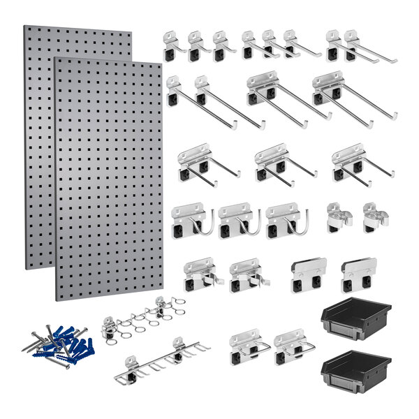 A gray steel Triton LocBoard with hooks and tools hanging on it.