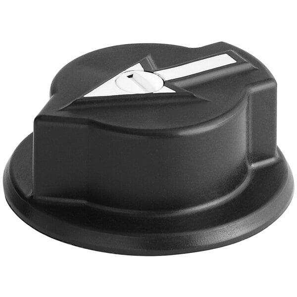 A black plastic Dema selector knob with a white stripe.