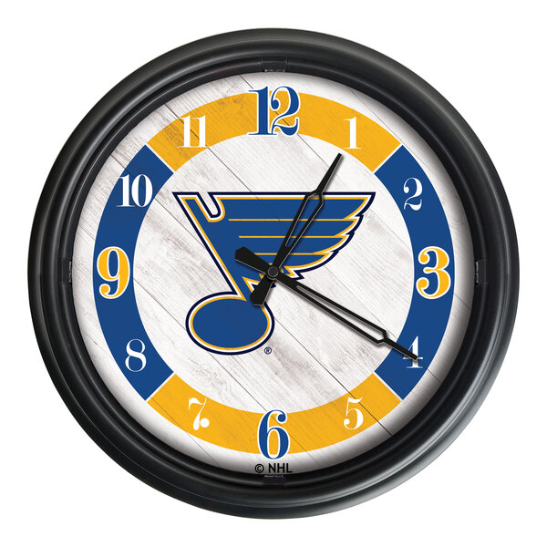A Holland Bar Stool 14" St. Louis Blues LED wall clock with a blue and yellow St. Louis Blues logo.