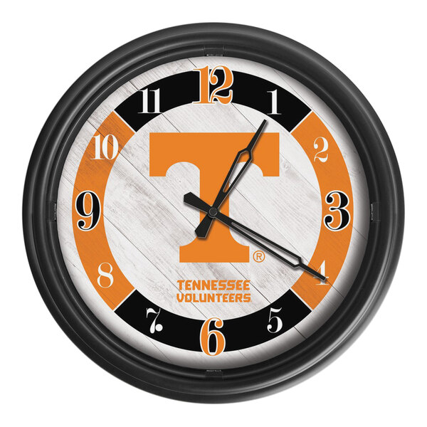 A Holland Bar Stool University of Tennessee wall clock with white and orange logo.