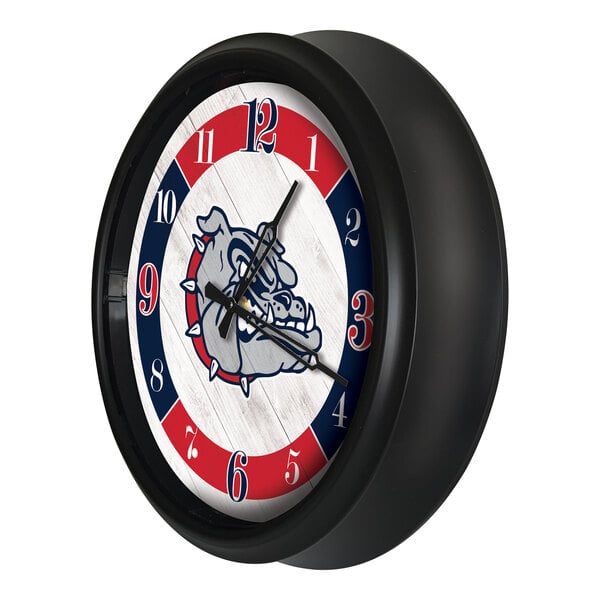 A round wall clock with a black frame featuring the Gonzaga Bulldogs logo and red, white, and blue accents.