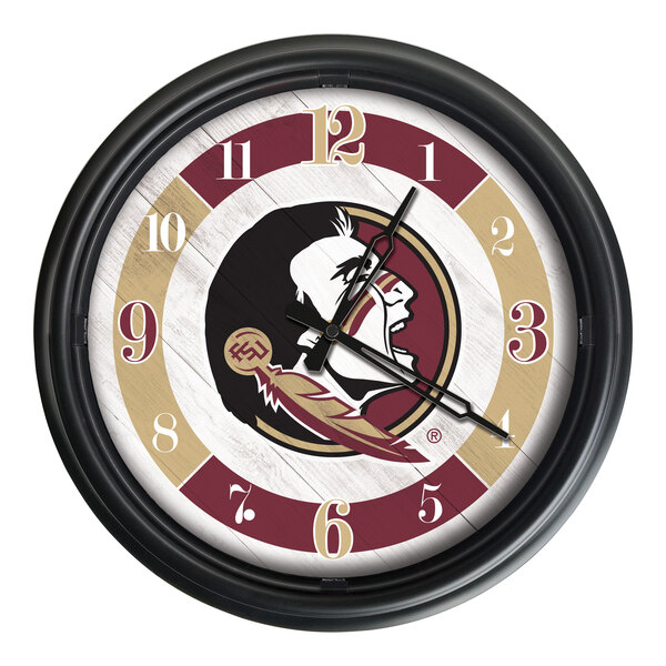 A close up of a white Holland Bar Stool Florida State Seminoles wall clock with a logo.