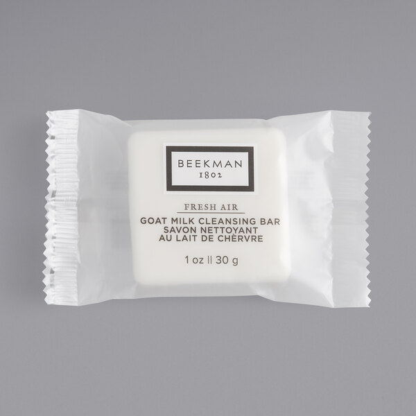 A white bar of Beekman 1802 Fresh Air soap with black text on the wrapper.