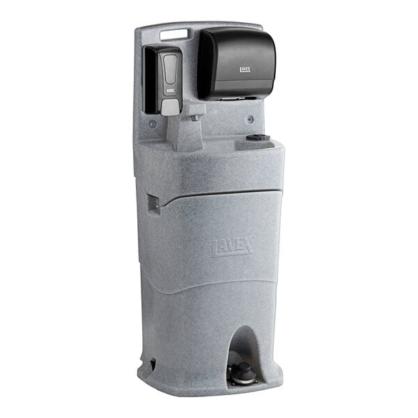 A grey Lavex hand wash station with a black and grey soap dispenser and paper towel dispenser.