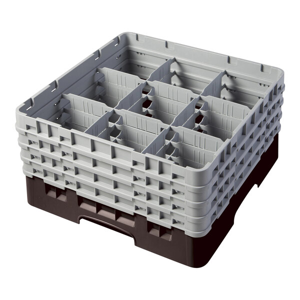 A brown plastic Camrack with nine compartments for glasses.