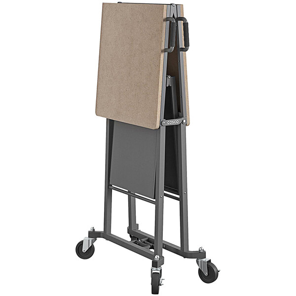 A Cosco portable workbench on a cart.