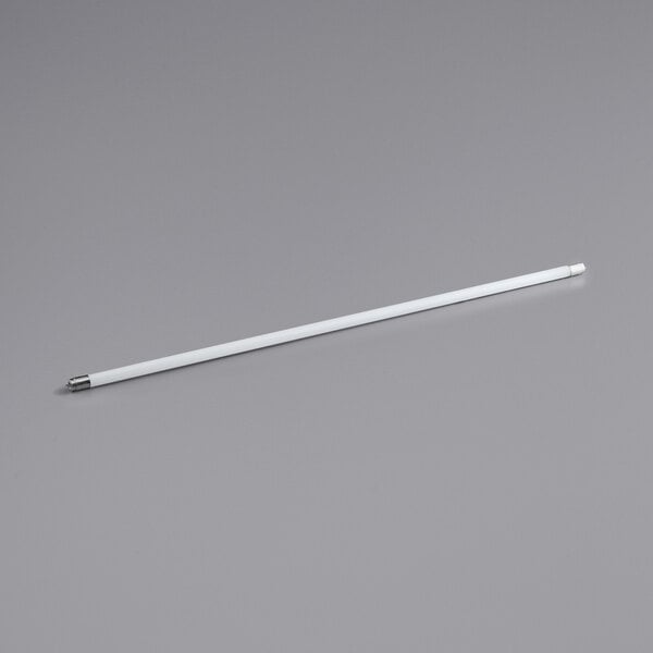 A TCP Pro Line 4' T8 LED tube with white ends on a gray surface.