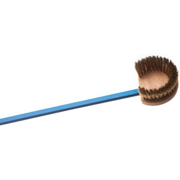 A GI Metal round brass brush with a wooden handle.