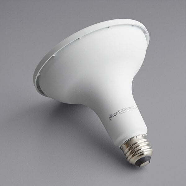 A white TCP PRO flood LED light bulb on a gray background.