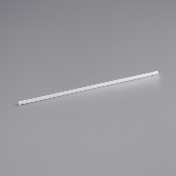 A white TCP Pro Line T8 LED tube on a gray surface.