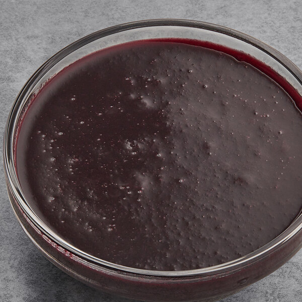 A bowl of Les Vergers Boiron Black Cherry fruit puree.