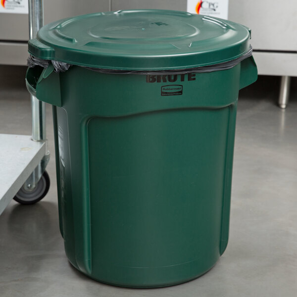 A green Rubbermaid BRUTE trash can lid.