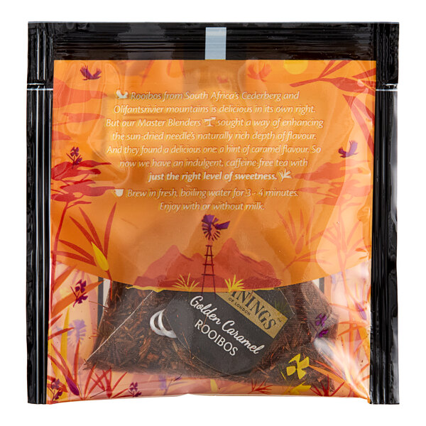 A package of Twinings Golden Caramel Rooibos large leaf pyramid tea sachets in a plastic bag.