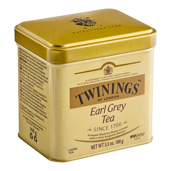 A square yellow Twinings box of Earl Grey loose leaf tea with a lid.