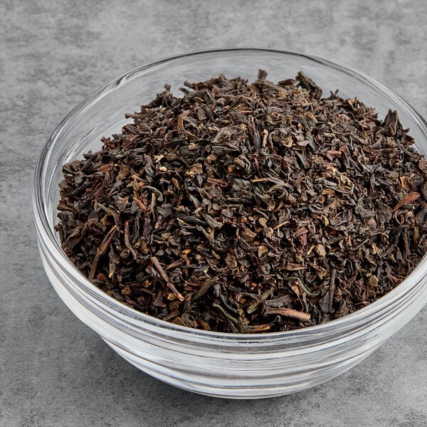 A bowl of Twinings Earl Grey loose leaf tea.