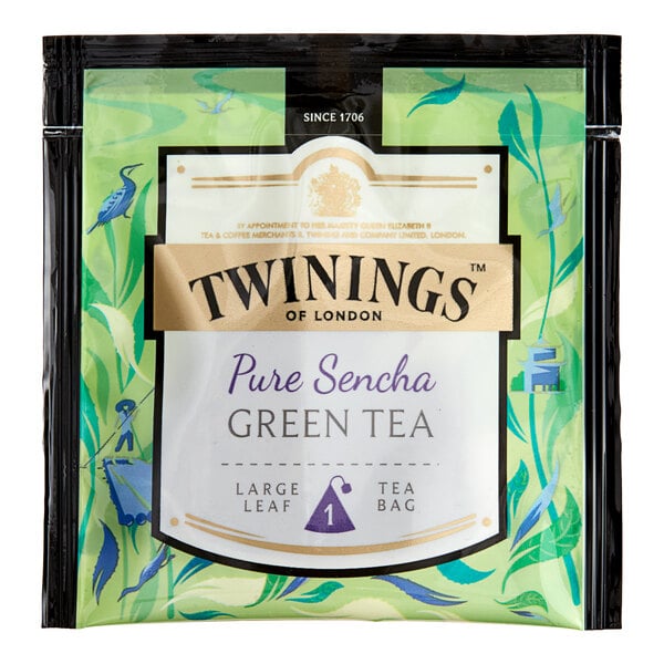 A green and white Twinings package of Pure Sencha Green Tea pyramid sachets.