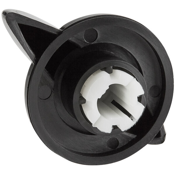 A black plastic knob with a white and black circle in the center.