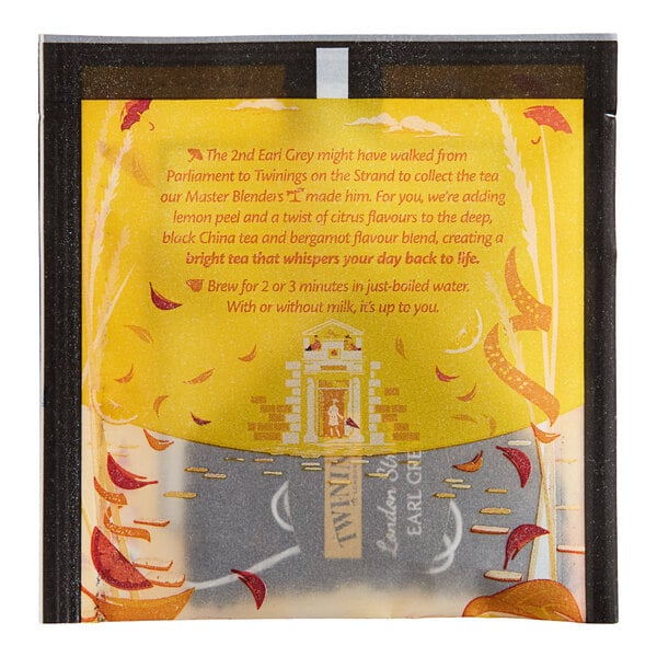 A yellow and black Twinings package of Earl Grey pyramid tea sachets with a leaf design.