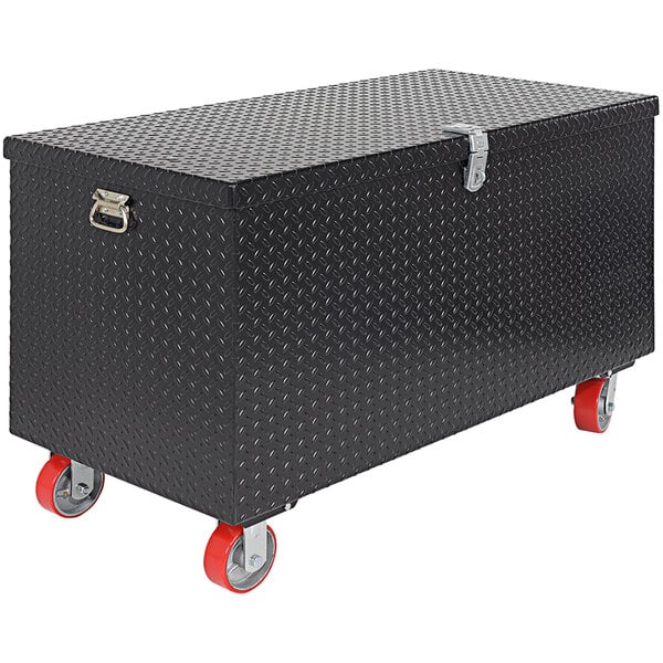 A black metal Vestil toolbox with red wheels.