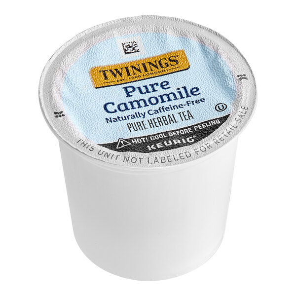 A white Twinings container with blue and black text for Pure Chamomile tea pods.