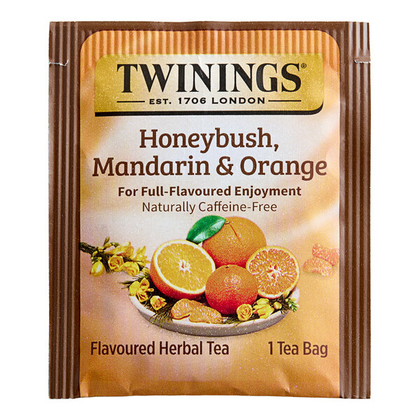 A package of Twinings Honeybush, Mandarin & Orange Herbal Tea Bags with oranges on it.