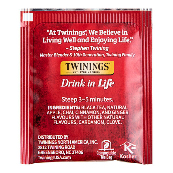 A red box of Twinings Spiced Apple Chai Tea Bags with white text.