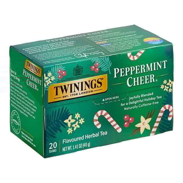 A green Twinings Peppermint Cheer tea box with white and red text.