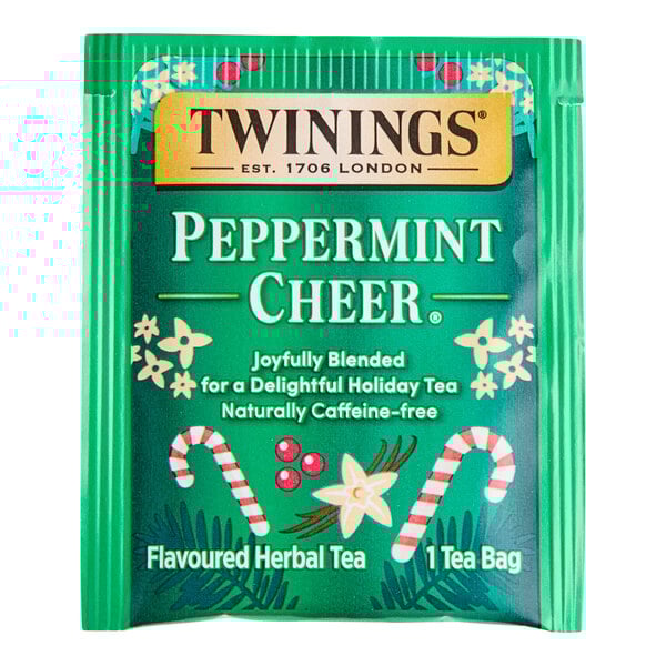 A green and white Twinings Peppermint Cheer tea bag package.