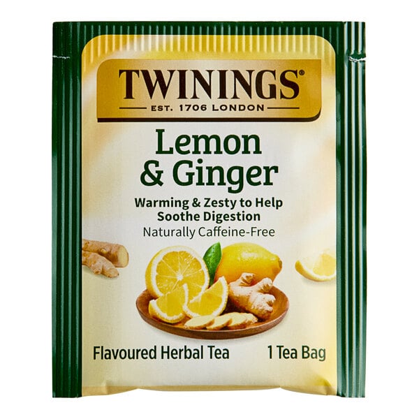 A green and white box of Twinings Lemon & Ginger Herbal Tea Bags.