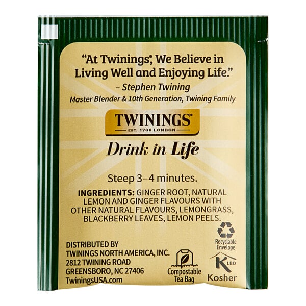 A green and white Twinings package of Lemon & Ginger Herbal Tea Bags.