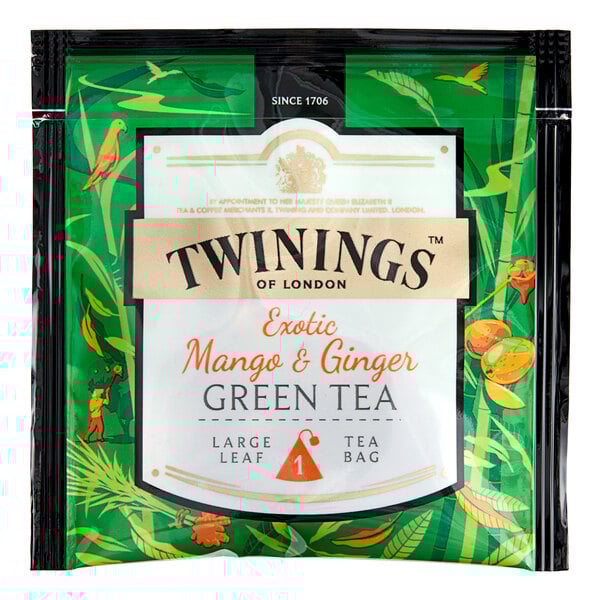 A green and white Twinings package of large leaf pyramid tea sachets with white labels.