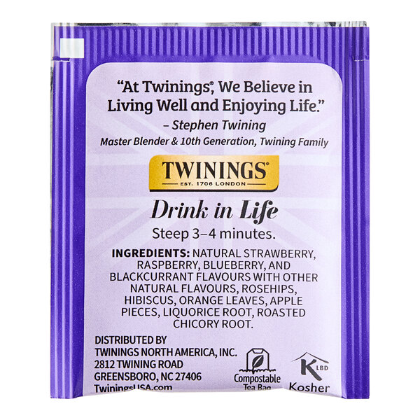A purple Twinings package with white and black text for Wild Berries Herbal Tea Bags.