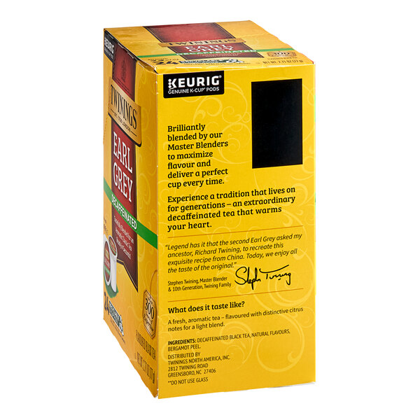 A yellow box of Twinings Earl Grey Decaffeinated Tea K-Cup Pods with black text.
