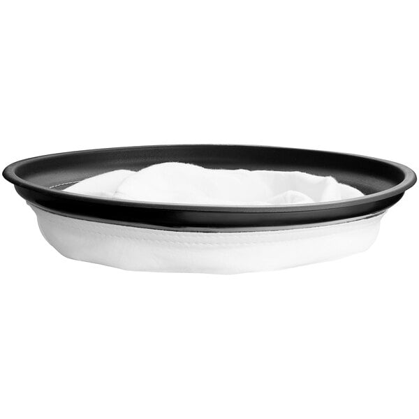 A white cloth in a black bowl.