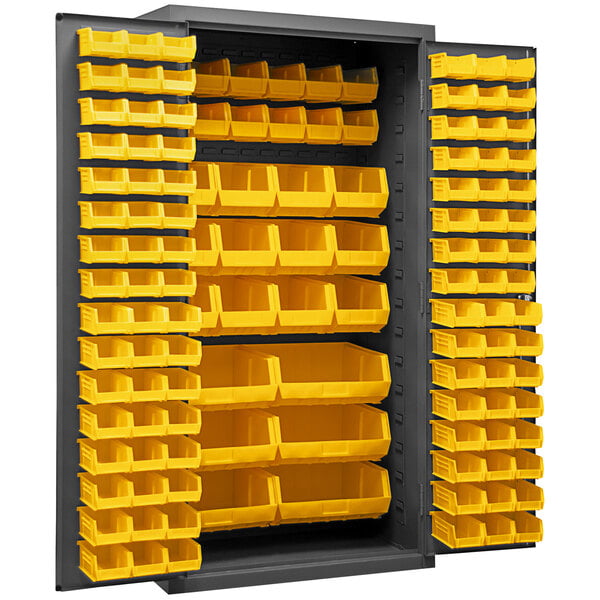A large metal Durham storage cabinet with yellow bins on shelves.