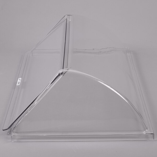 An APW Wyott single door sneeze guard with a curved clear plastic cover.