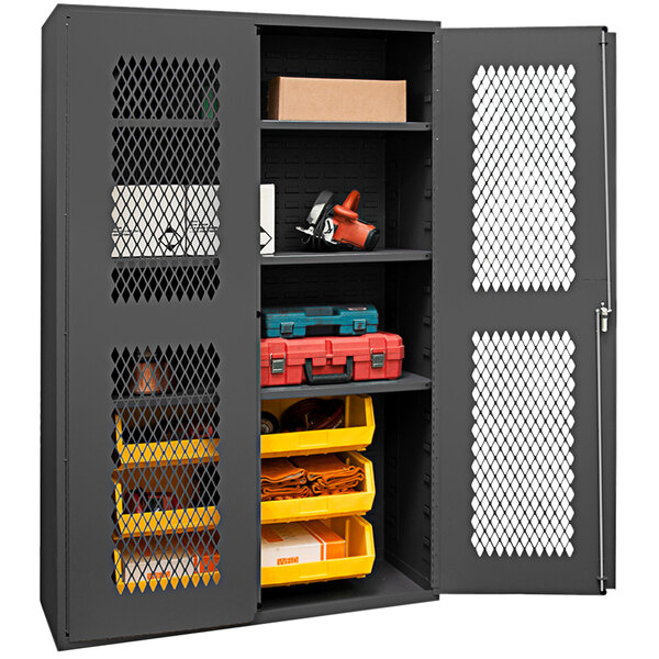 A Durham metal storage cabinet with yellow bins inside.