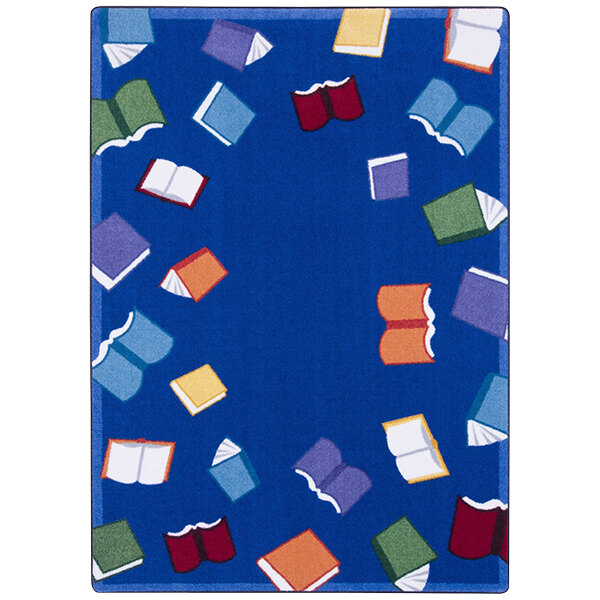 A multi-colored area rug with blue, red, and yellow books on it.