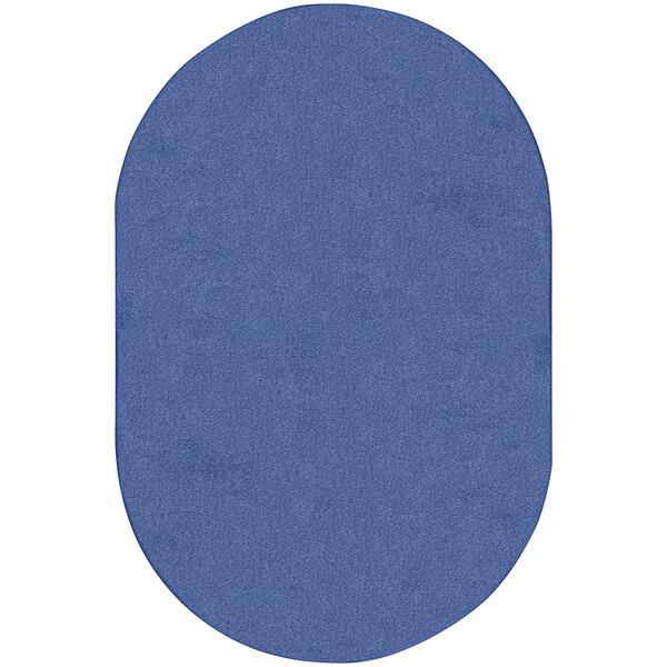 A cobalt blue oval shaped area rug.
