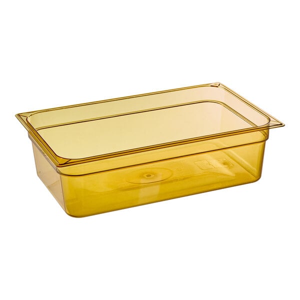 A yellow Carlisle plastic food pan with a lid.