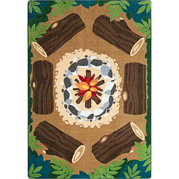 A Joy Carpets area rug with a pattern of logs and fire.