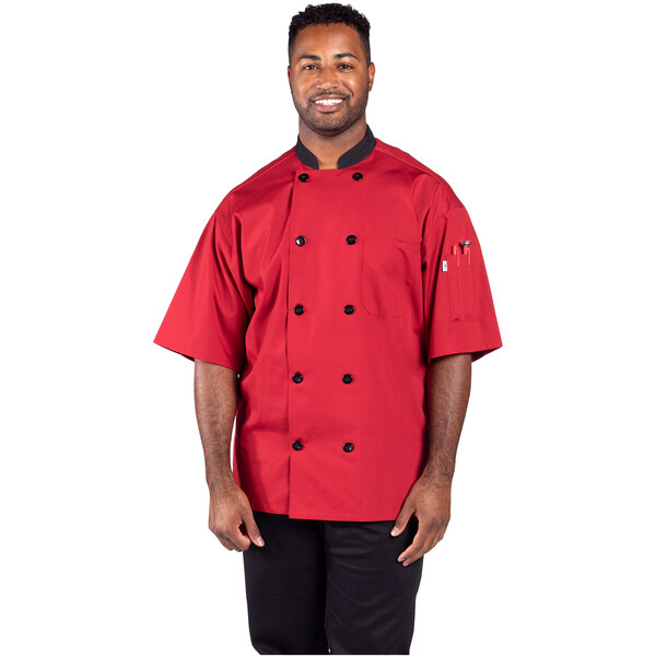 A man wearing an Uncommon Chef red chef coat.