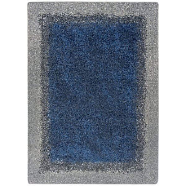 A Joy Carpets rectangle area rug with a blue center and gray border with marine designs.